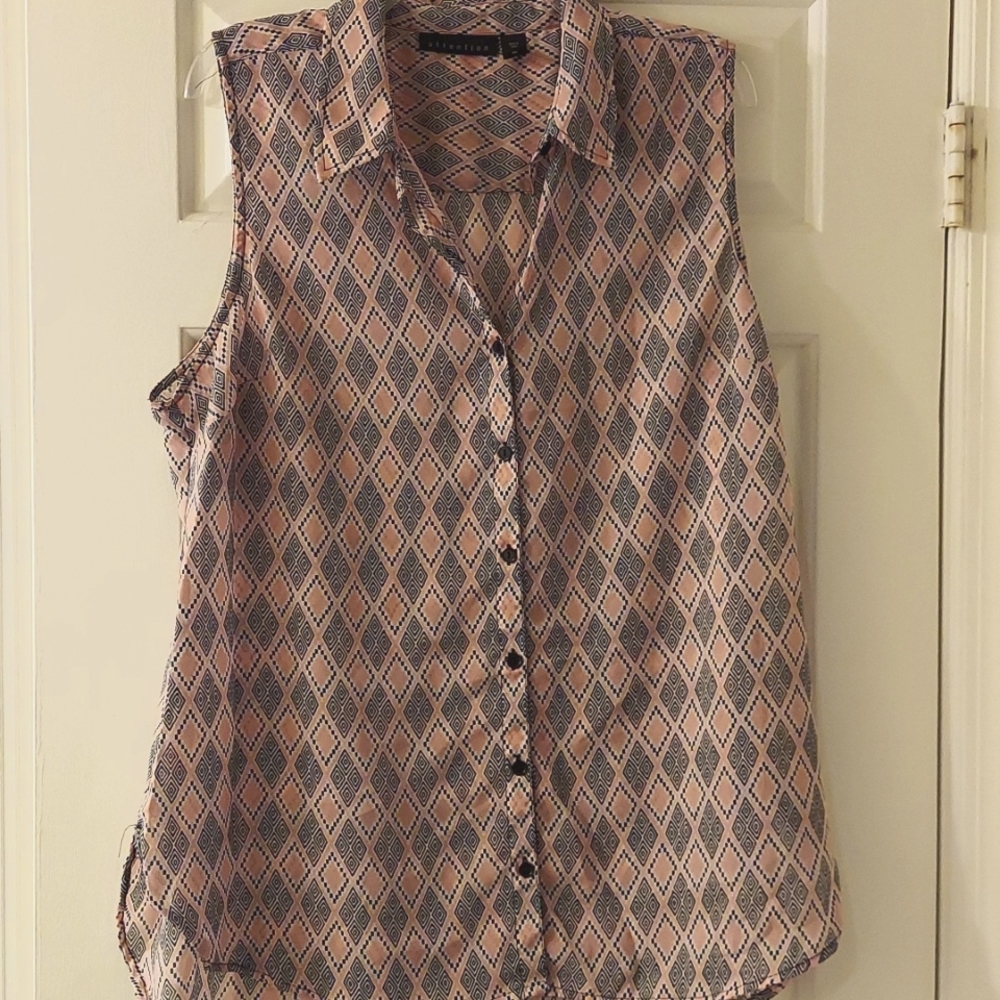 Sheer pink and black patterned sleeveless blouse